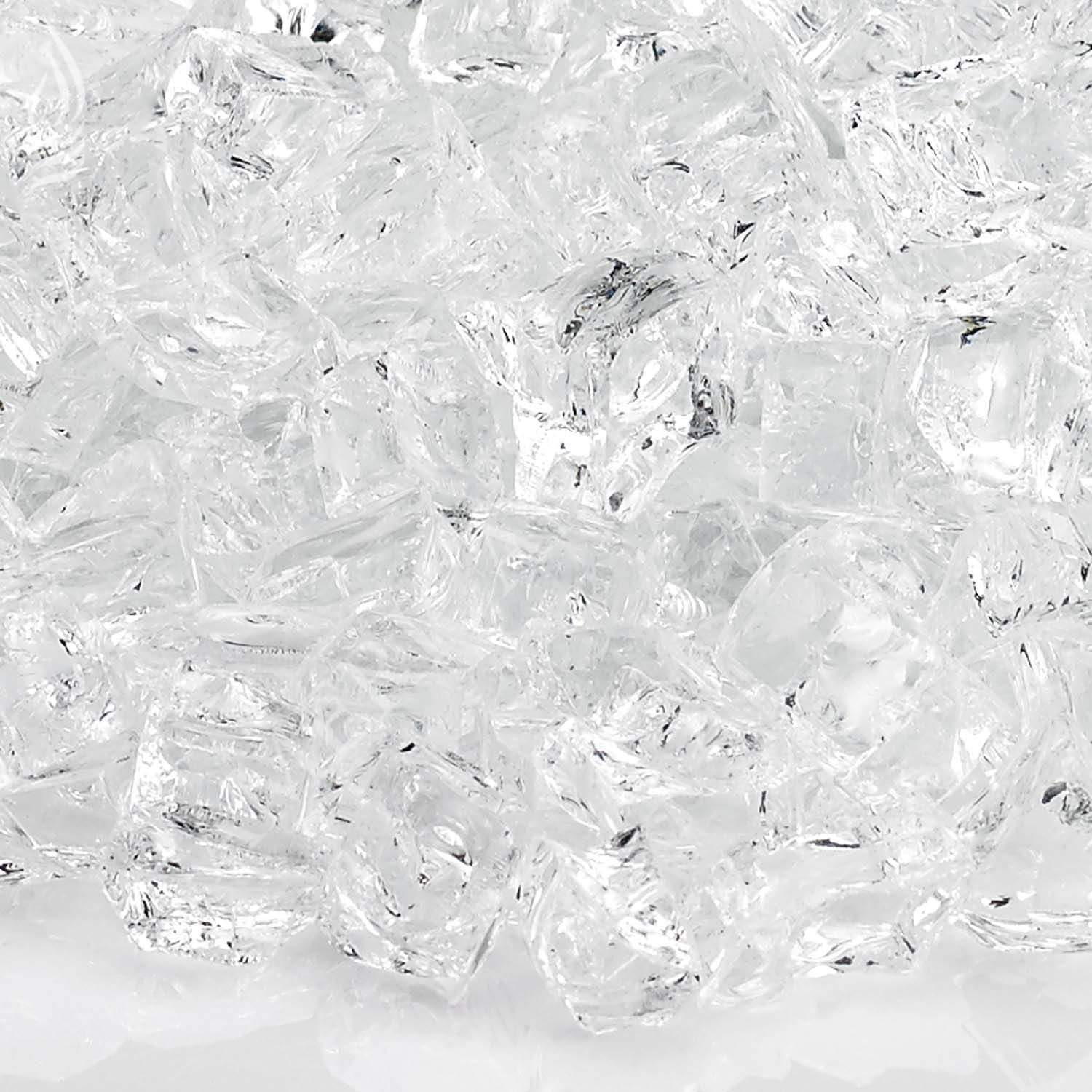 Close-up of clear fire glass chunks with faceted, transparent texture