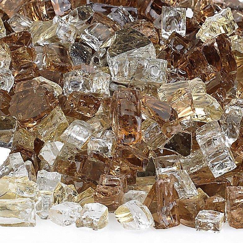 Close-up reflective fire glass cubes, clear silver, smoky brown, and champagne gold mix