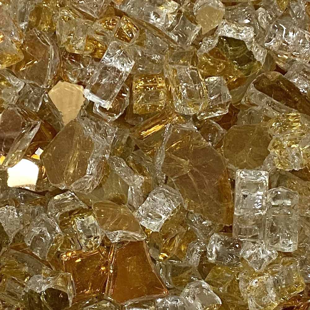 Close-up of gold and clear reflective fire glass pieces