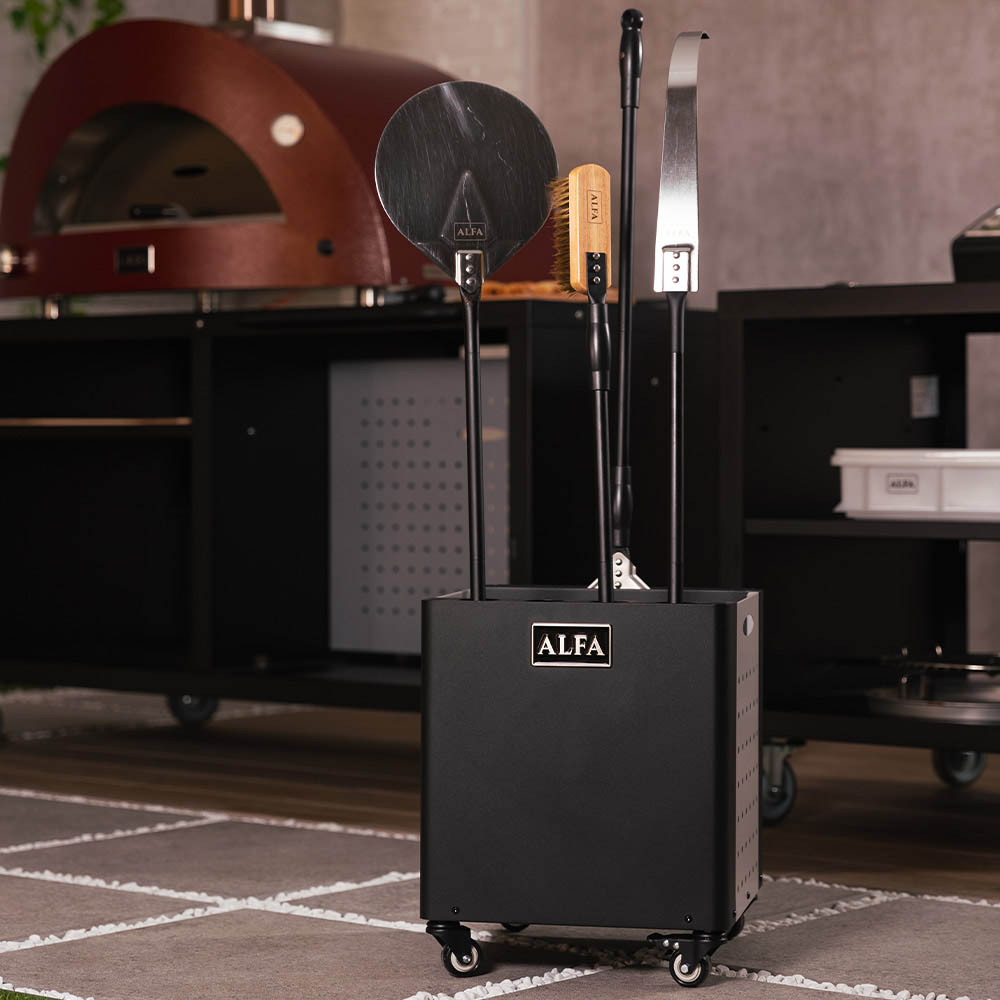 Black pizza peel holder on casters with three peels standing upright