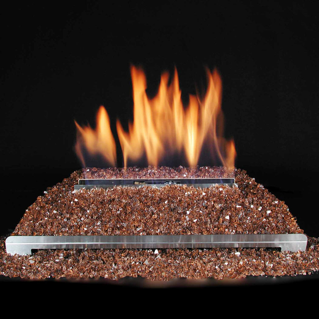 Ventless burner with orange flames over copper fire glass media