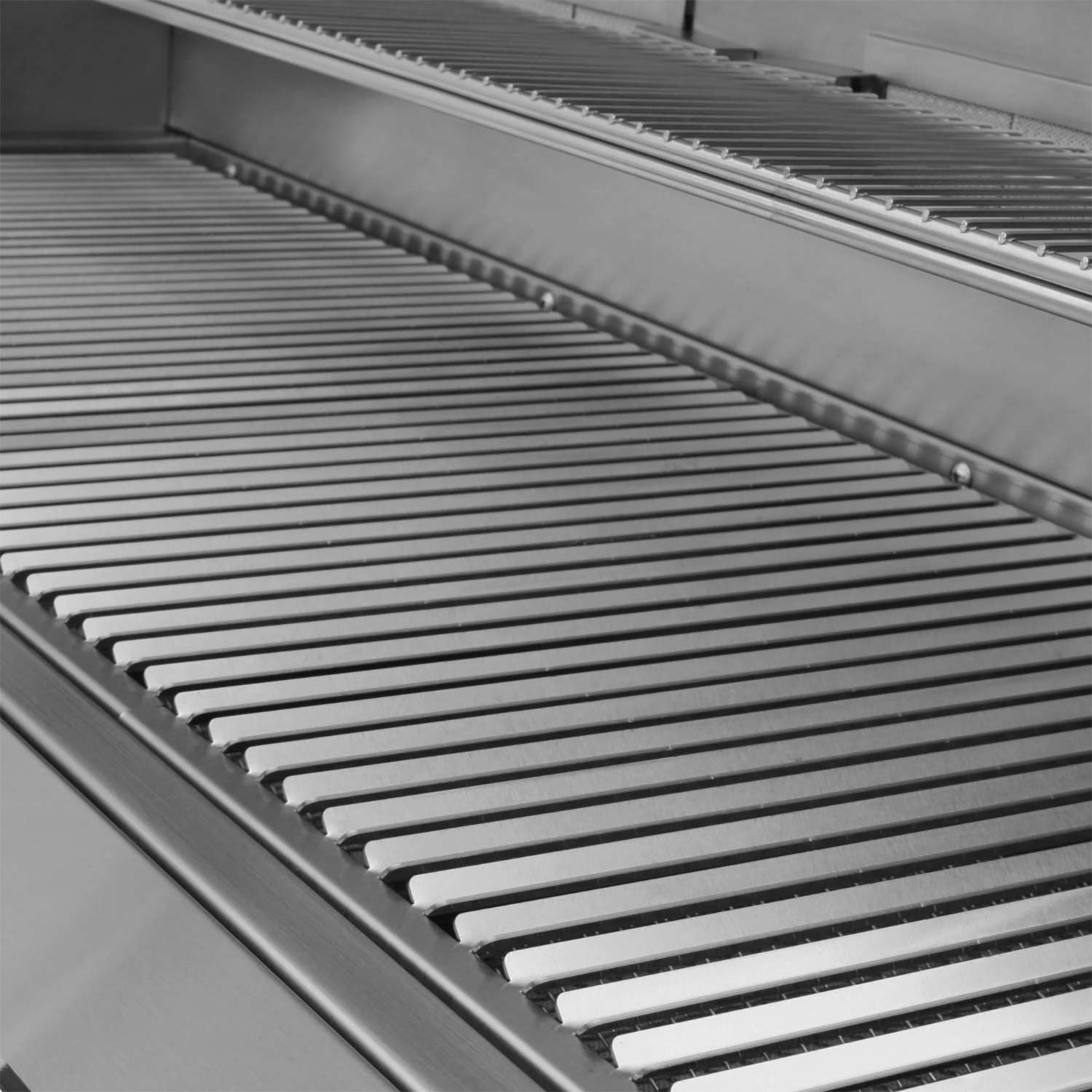 Stainless steel grill grates with parallel heating bars inside the cooking area