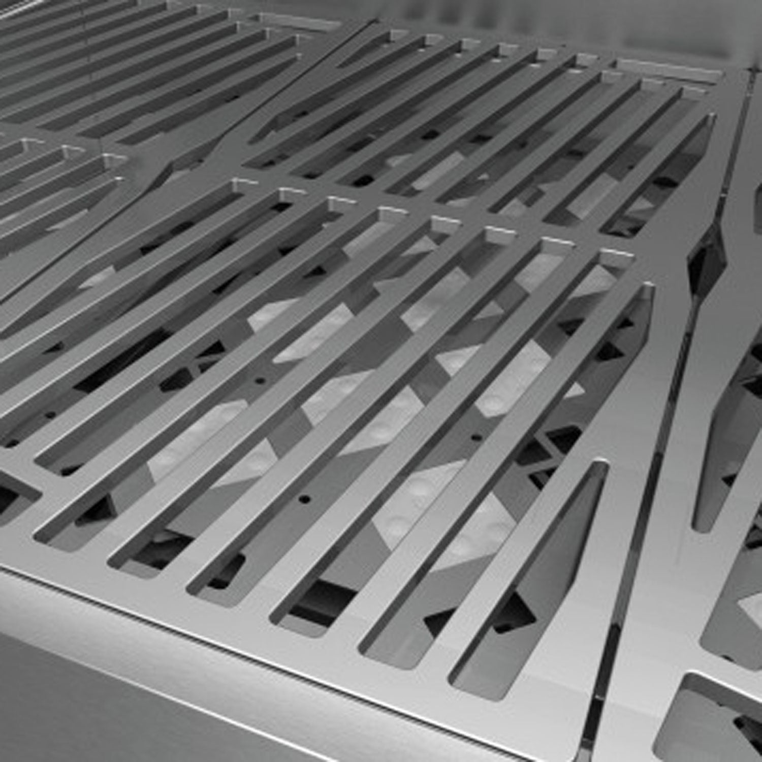 Close-up of gray metal grill grate with long parallel bars and slots
