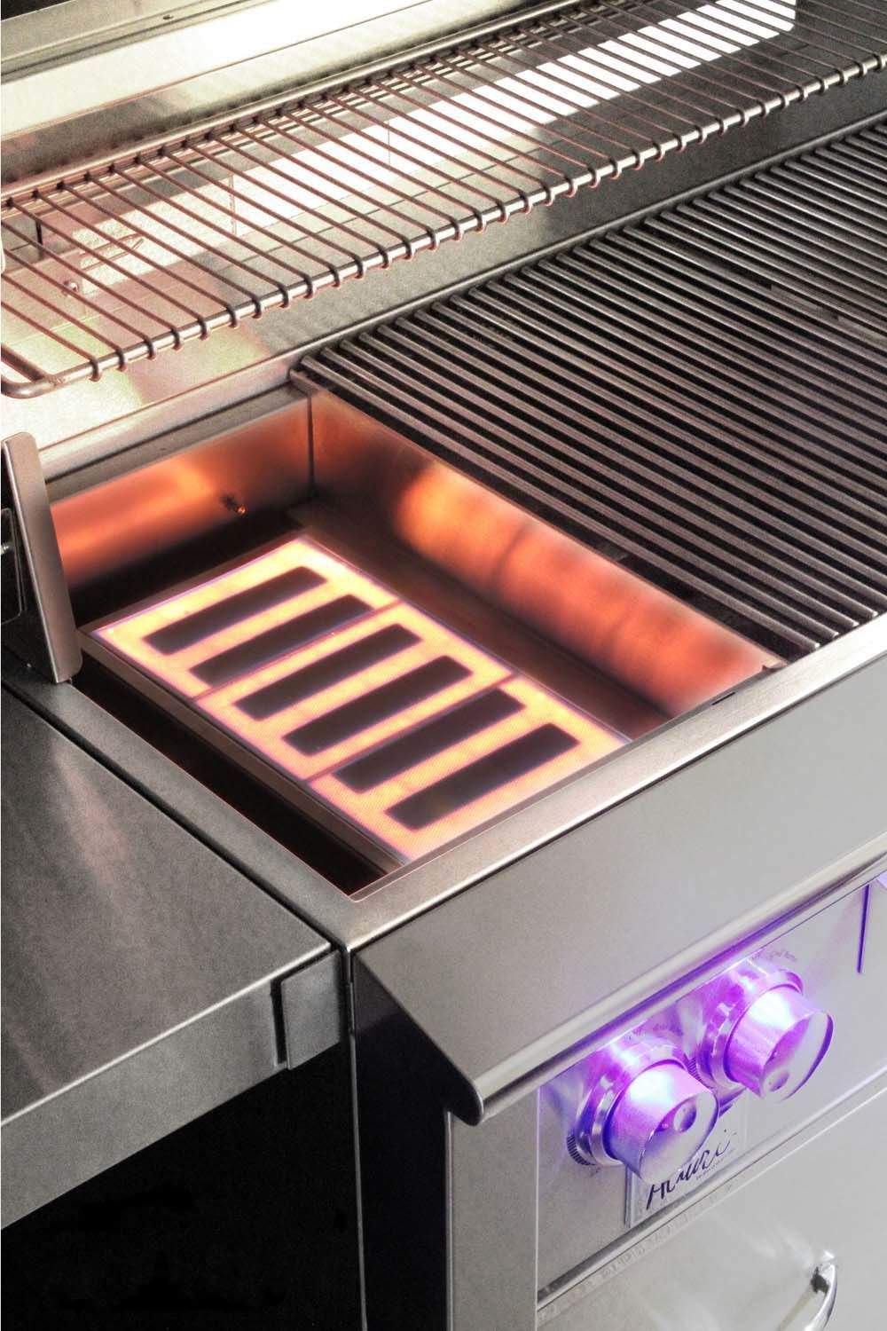Infrared sear burner heating area glowing orange inside grill grate