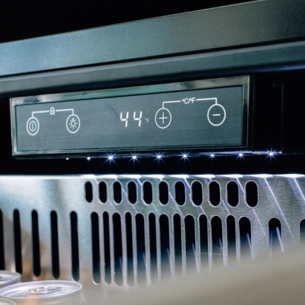 Ice maker control panel with digital display and ventilation grille underneath