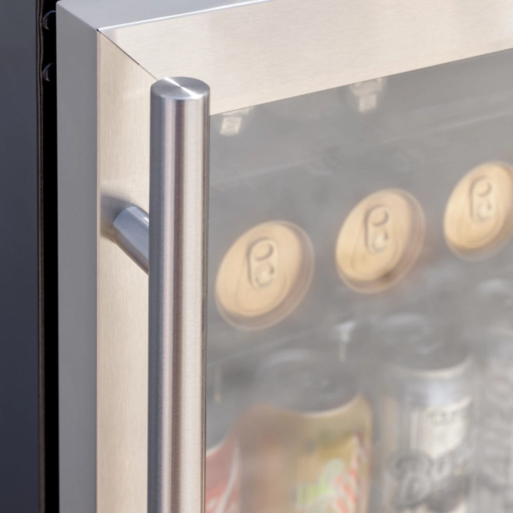 Refrigerator door handle with interior wall and bottle caps visible