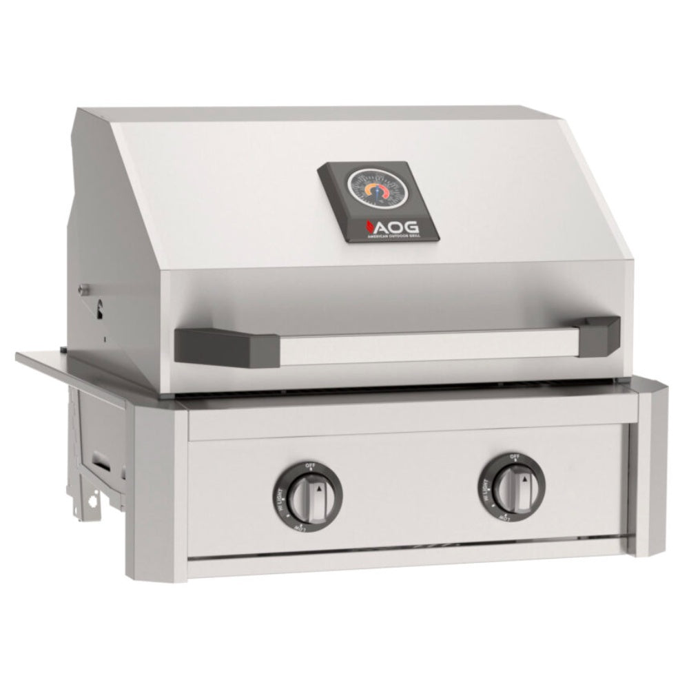 Built-in gas grill with stainless hood, two control knobs, and front access panels