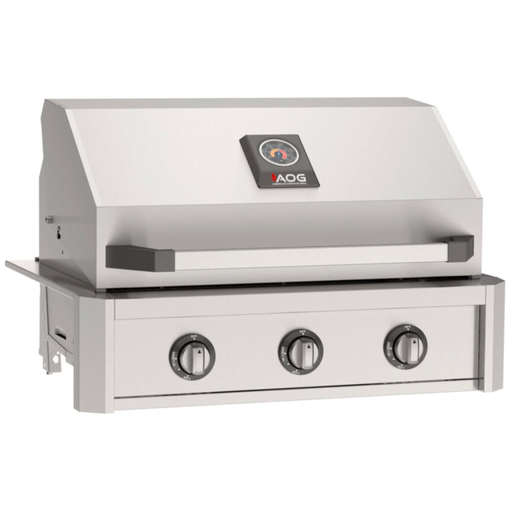Stainless steel built-in gas grill with three round control knobs and warming hood