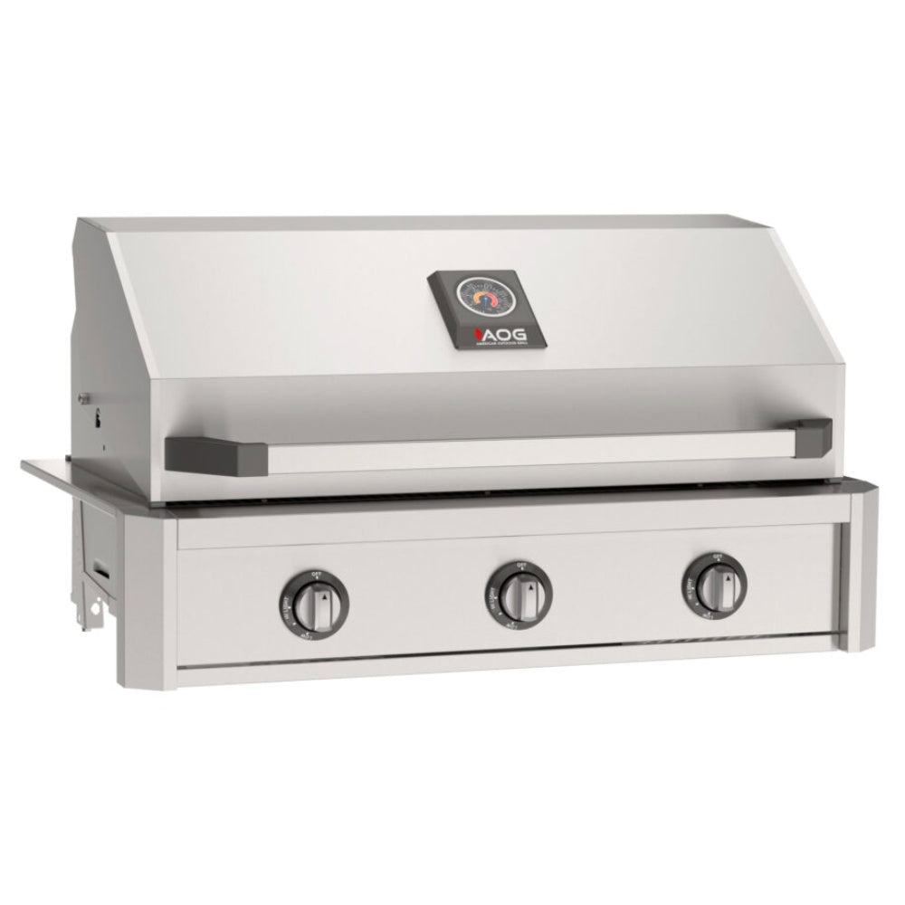 Built-in gas grill with stainless front panel and three round control knobs