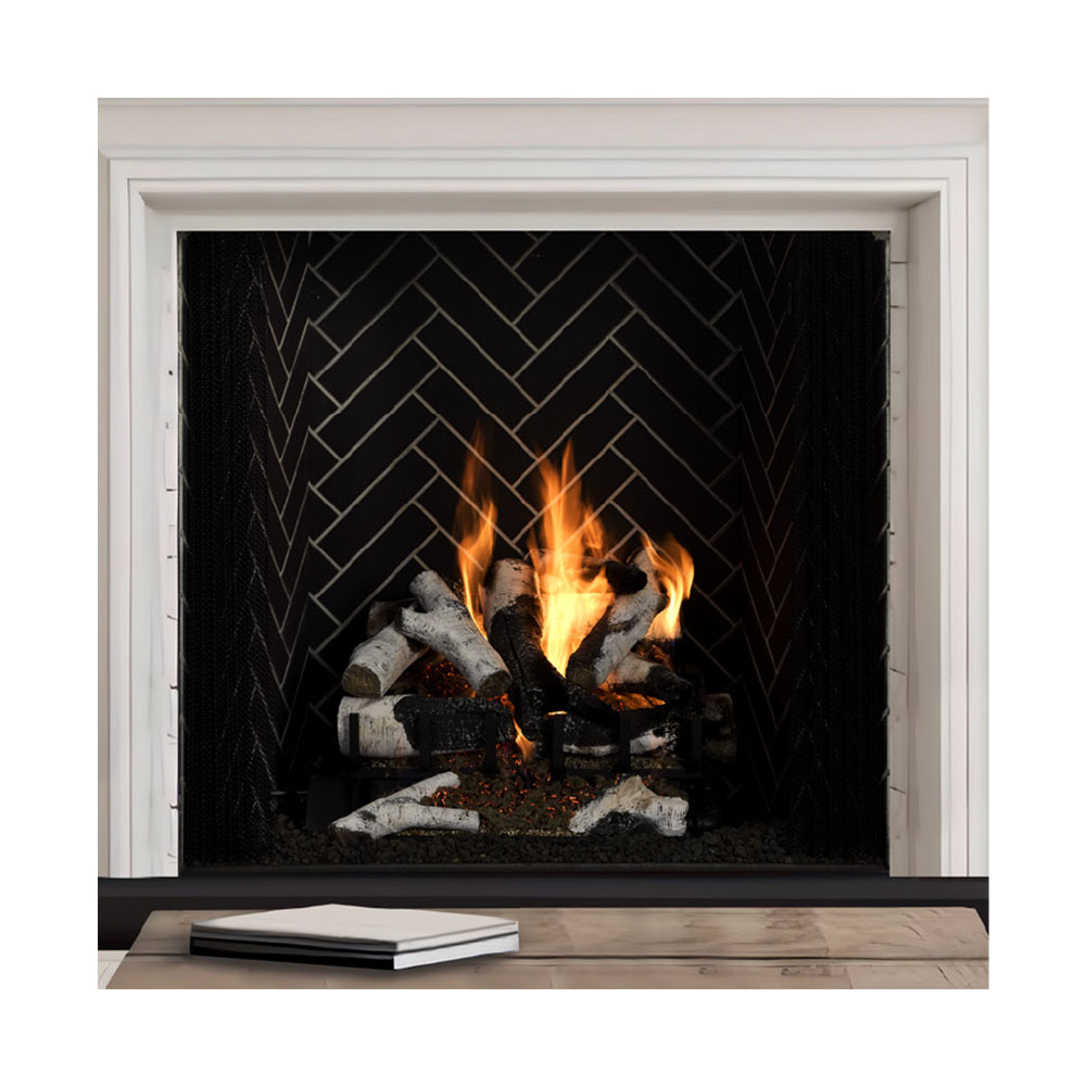 White wood burning fireplace with black herringbone firebox panel and burning logs