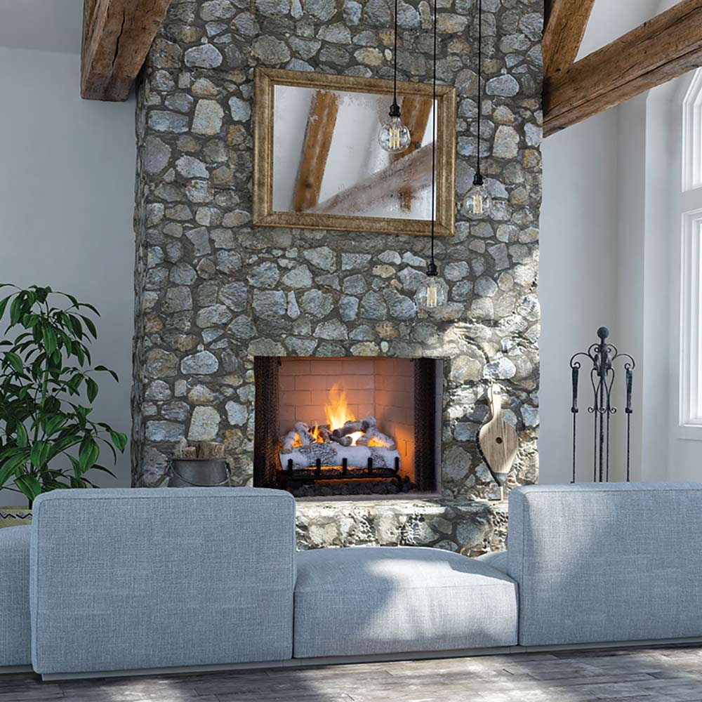 Gas fireplace with glowing logs and flames in stone surround, with decorative supports