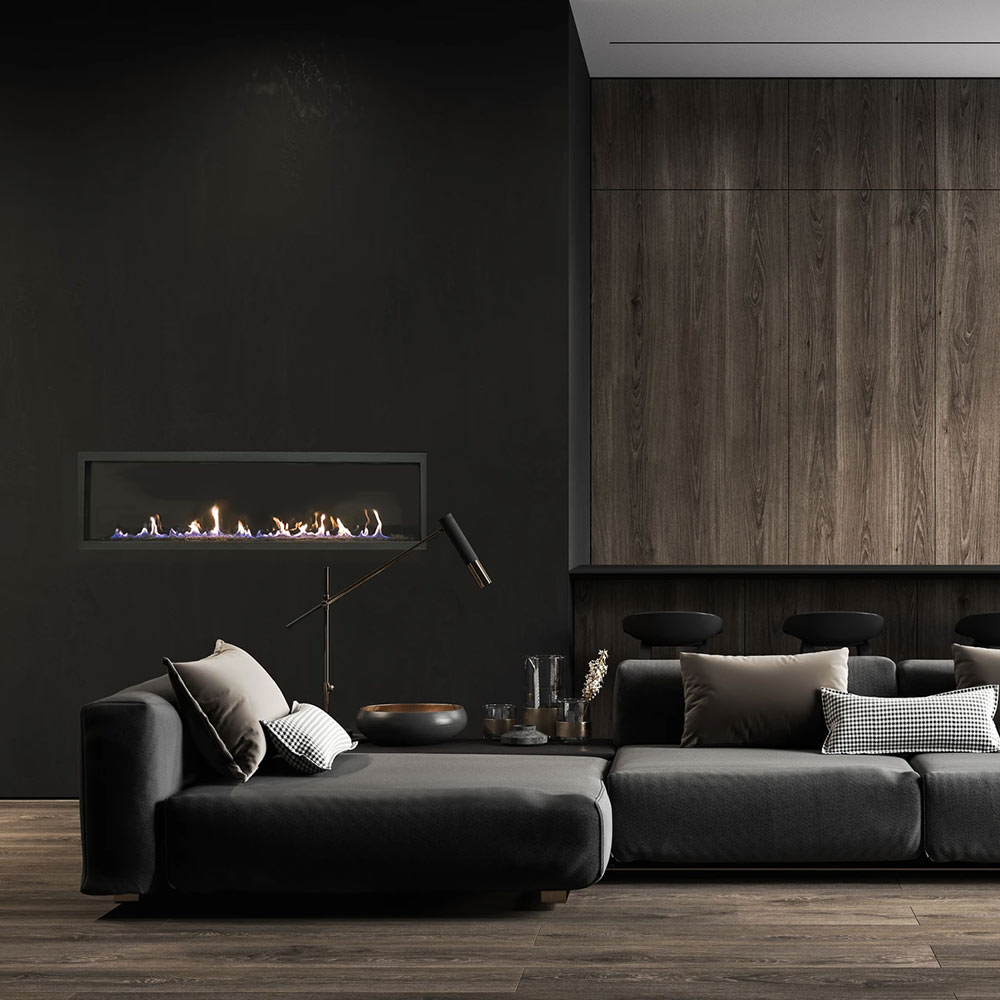 Built-in linear gas fireplace with flames in a dark wall recess and black trim.