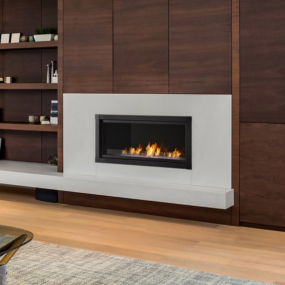 Wall-mounted vent-free gas fireplace with flames in black-trimmed opening