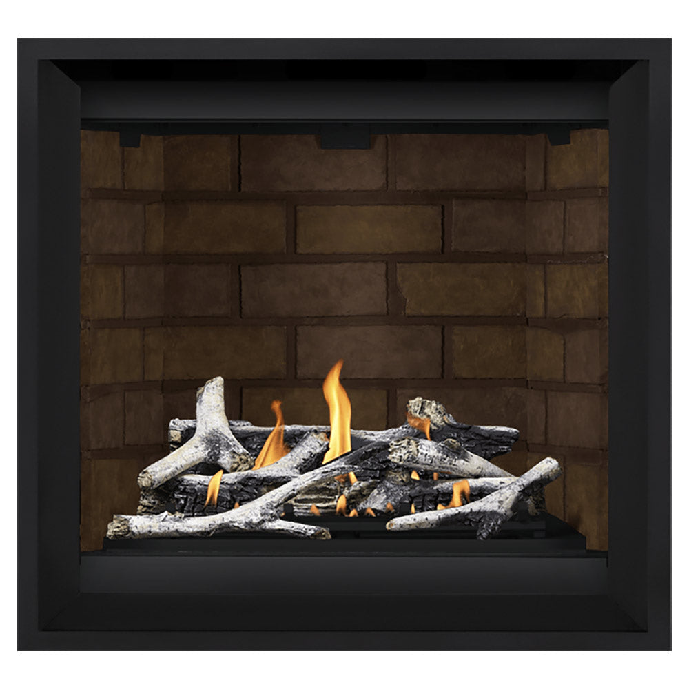 Black direct vent gas fireplace with light gray logs, orange flames, and brown brick back panel