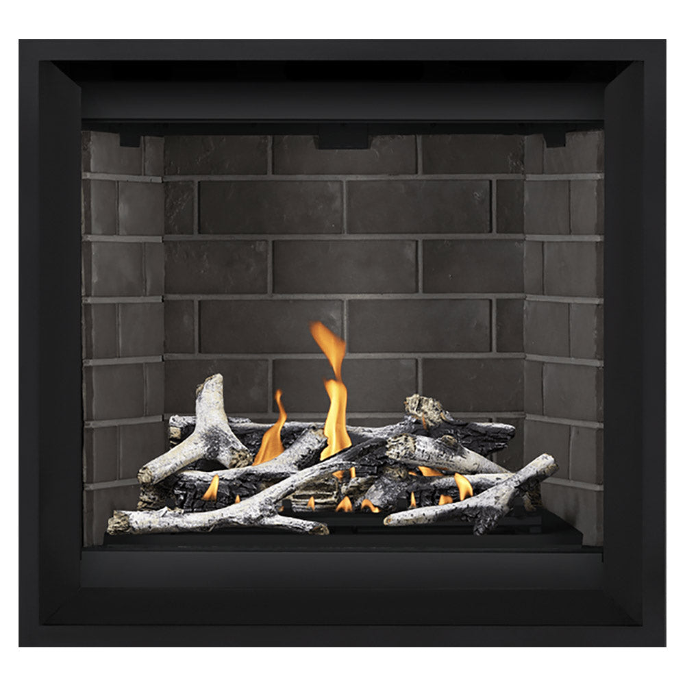 Black direct vent gas fireplace with light gray logs, orange flames, and gray brick back panel