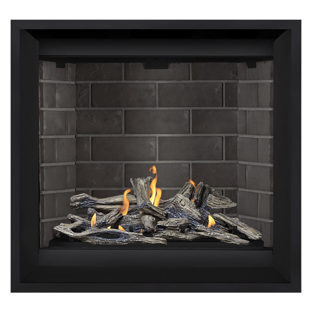 Gas fireplace with black surround and burning log set against gray brick panels