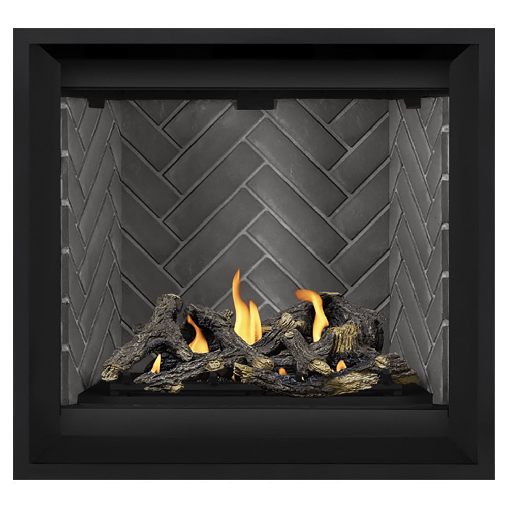 Gas fireplace firebox with gray herringbone back panel and burning log set