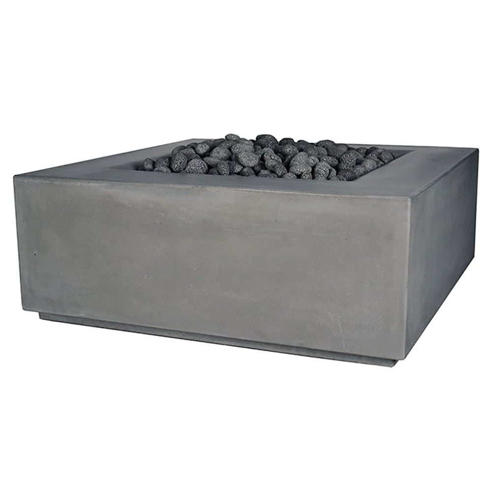 Square fire pit table with dark gray concrete finish and black lava rocks in bowl
