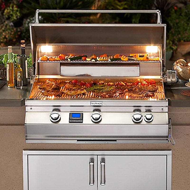 Open stainless gas grill with lit burners and cooking racks