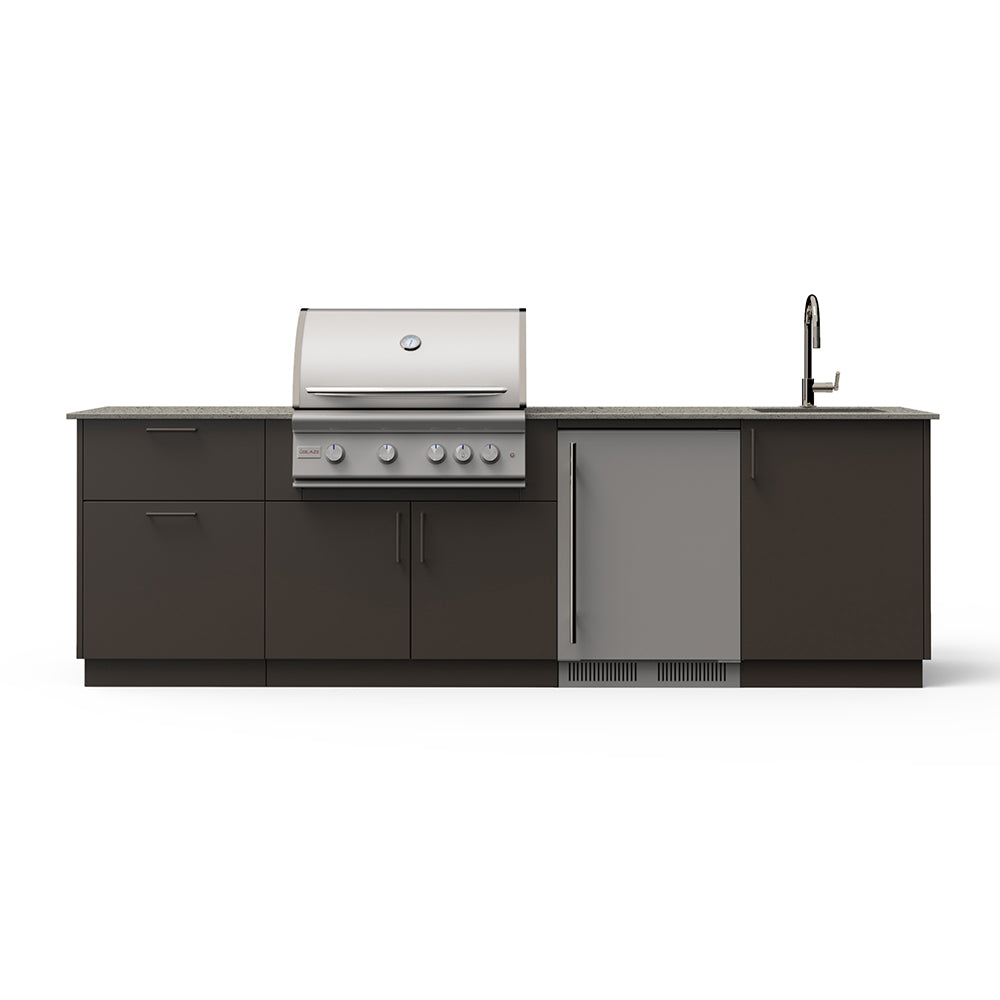 Outdoor kitchen island with built-in grill, sink faucet, and dark cabinet doors