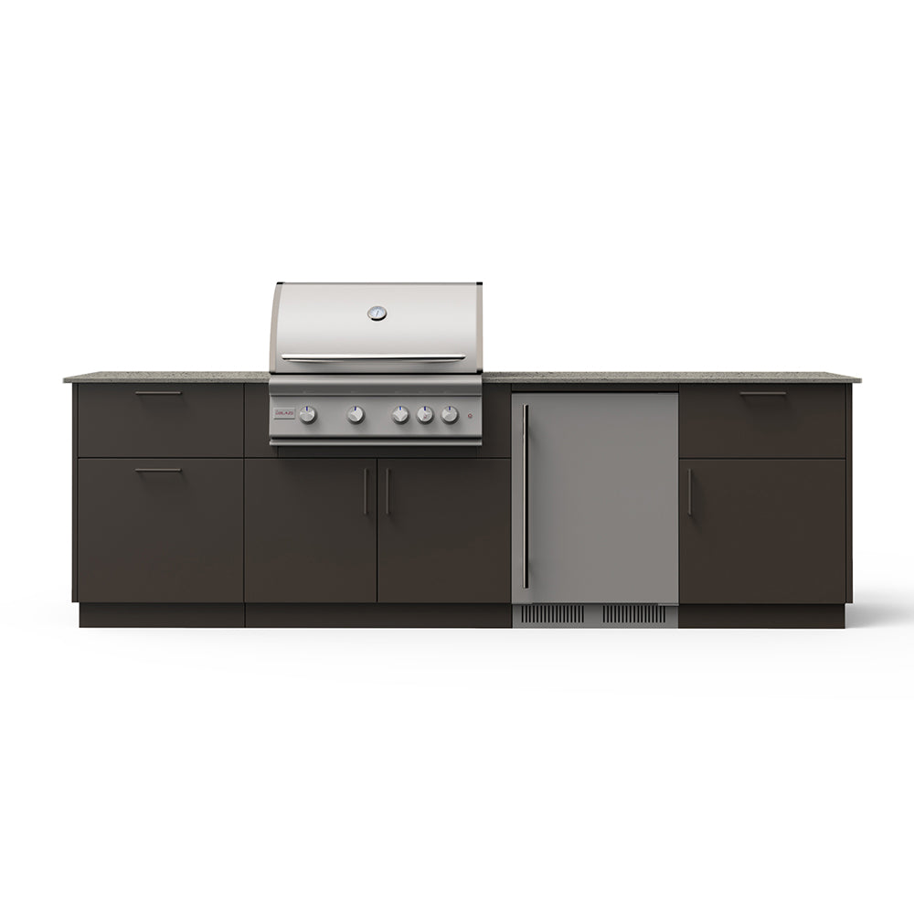 Outdoor kitchen island with grill hood and refrigerator, dark cabinetry and light countertop