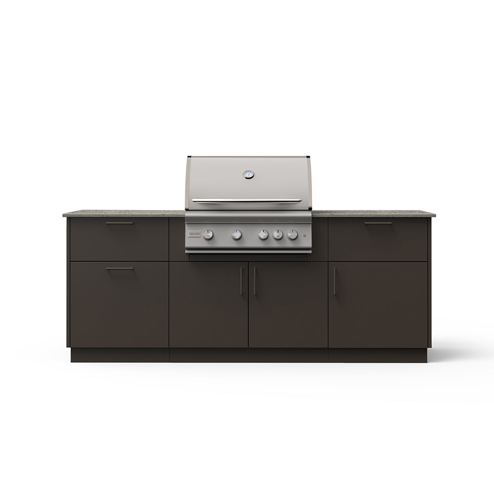 Outdoor kitchen island with built-in grill, dark base cabinets and light countertop