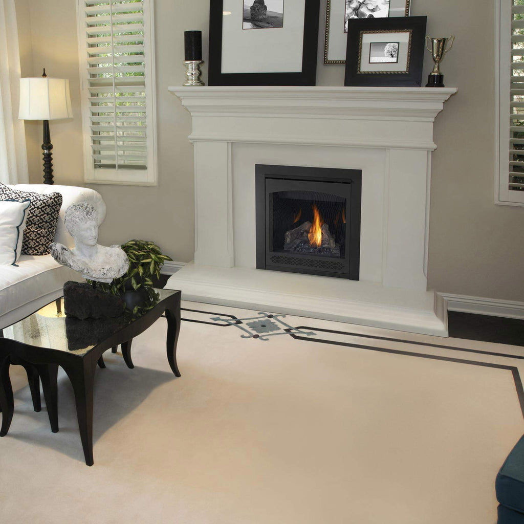 Built-in direct vent gas fireplace with black firebox and small flames inside