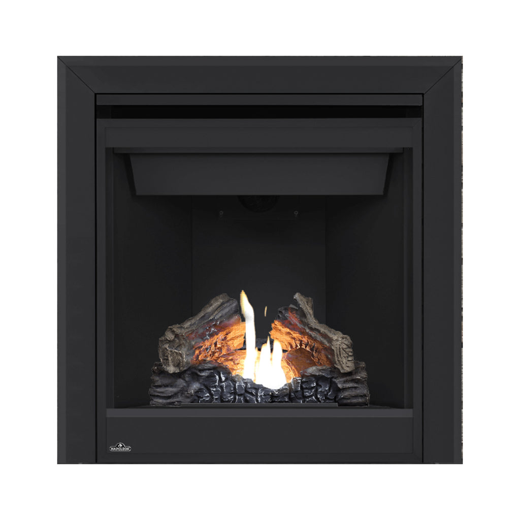 Black gas fireplace insert with glowing flames and stacked faux logs over dark stones