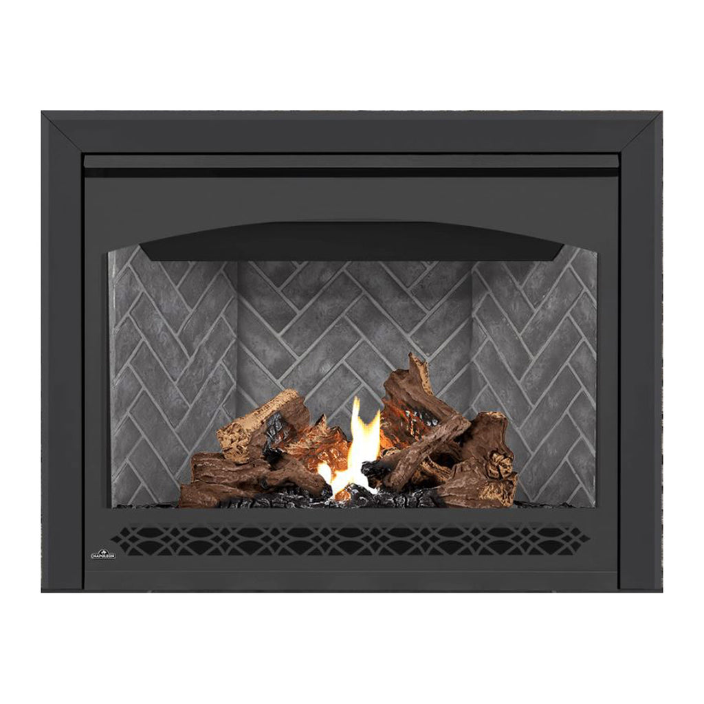Gas fireplace with black frame, glass front, burning logs, and gray stone back panel