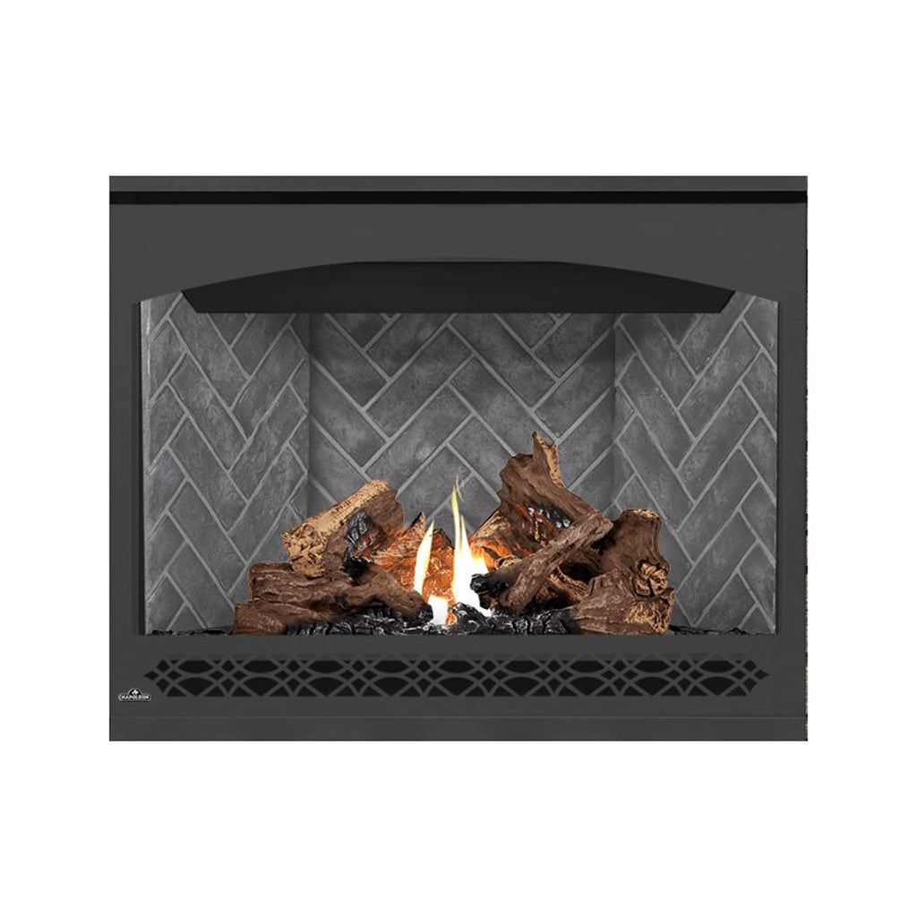 Direct-vent gas fireplace with dark frame and burning logs behind gray brick-pattern panel.