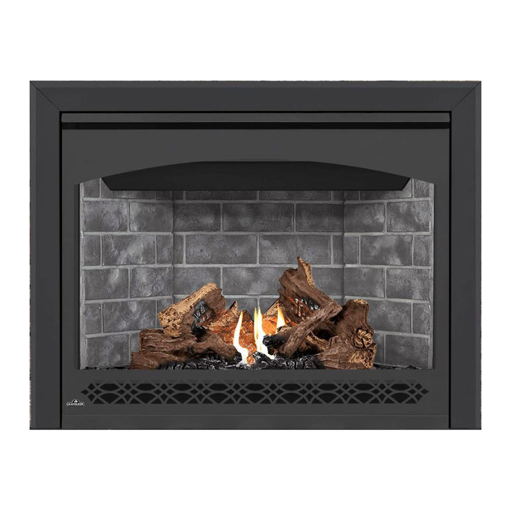Black gas fireplace with glass front, gray brick backdrop, burning logs and front vent grille