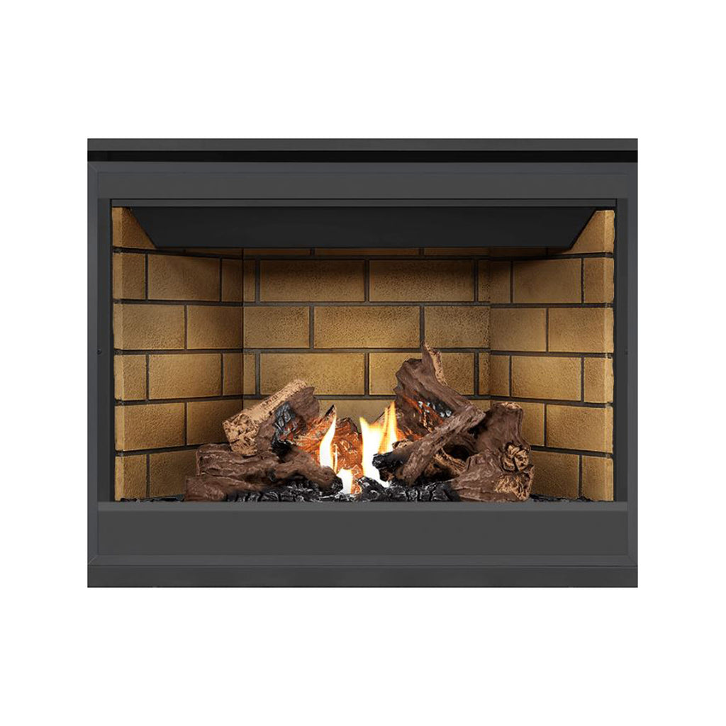 Direct vent gas fireplace with burning logs and flame in tan brick surround