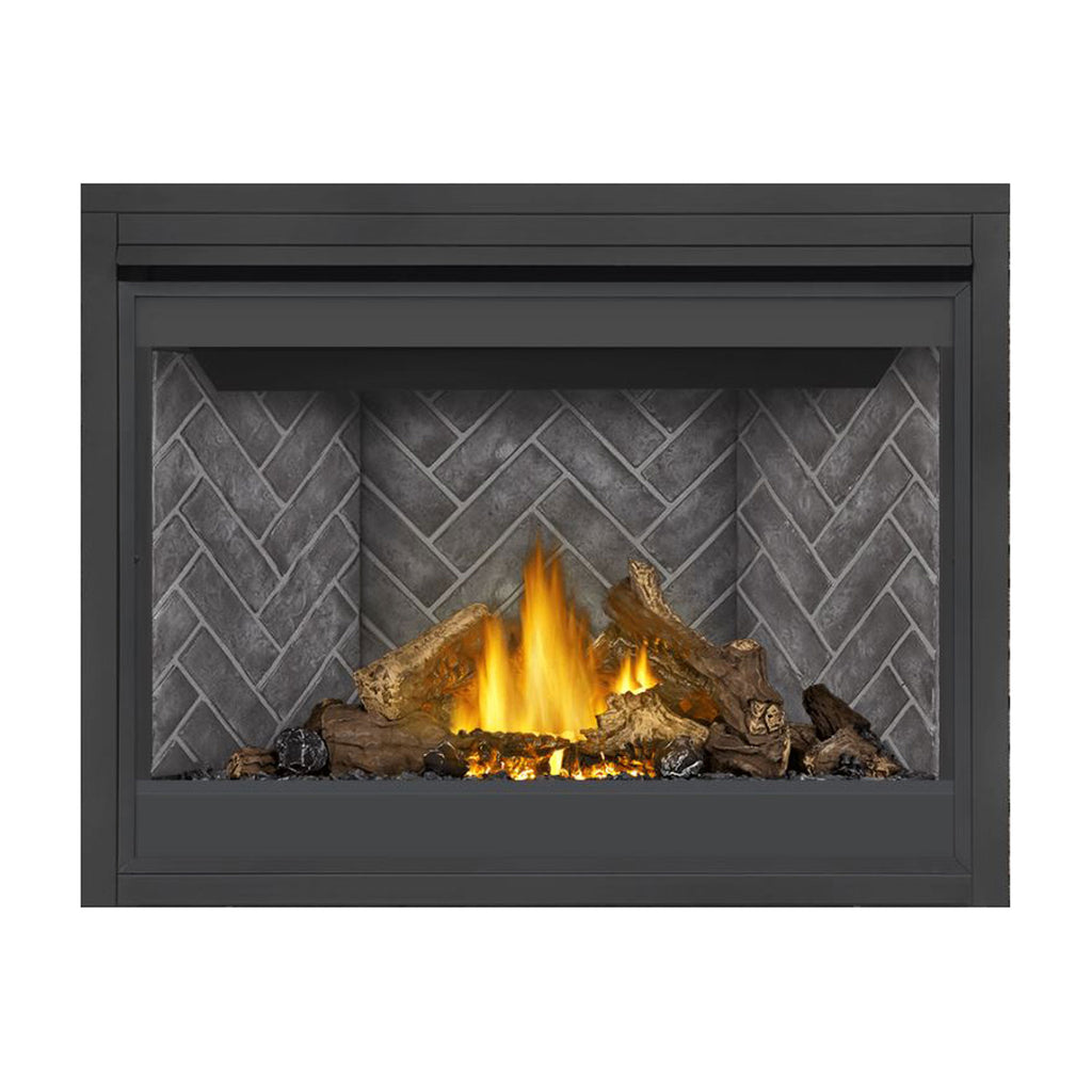 Direct vent gas fireplace with dark surround, burning logs, and gray brick-pattern back panel.
