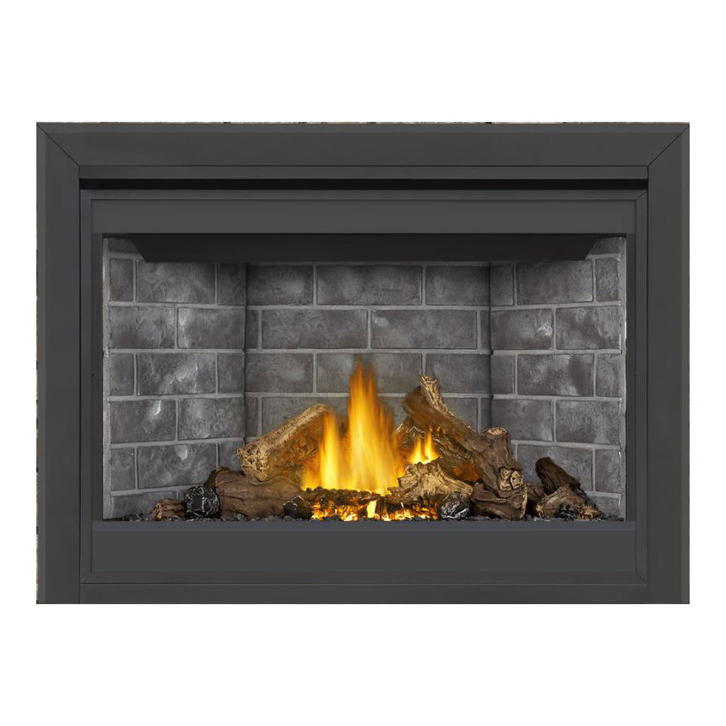 Direct vent gas fireplace with dark surround, burning logs, and gray stone block back wall.