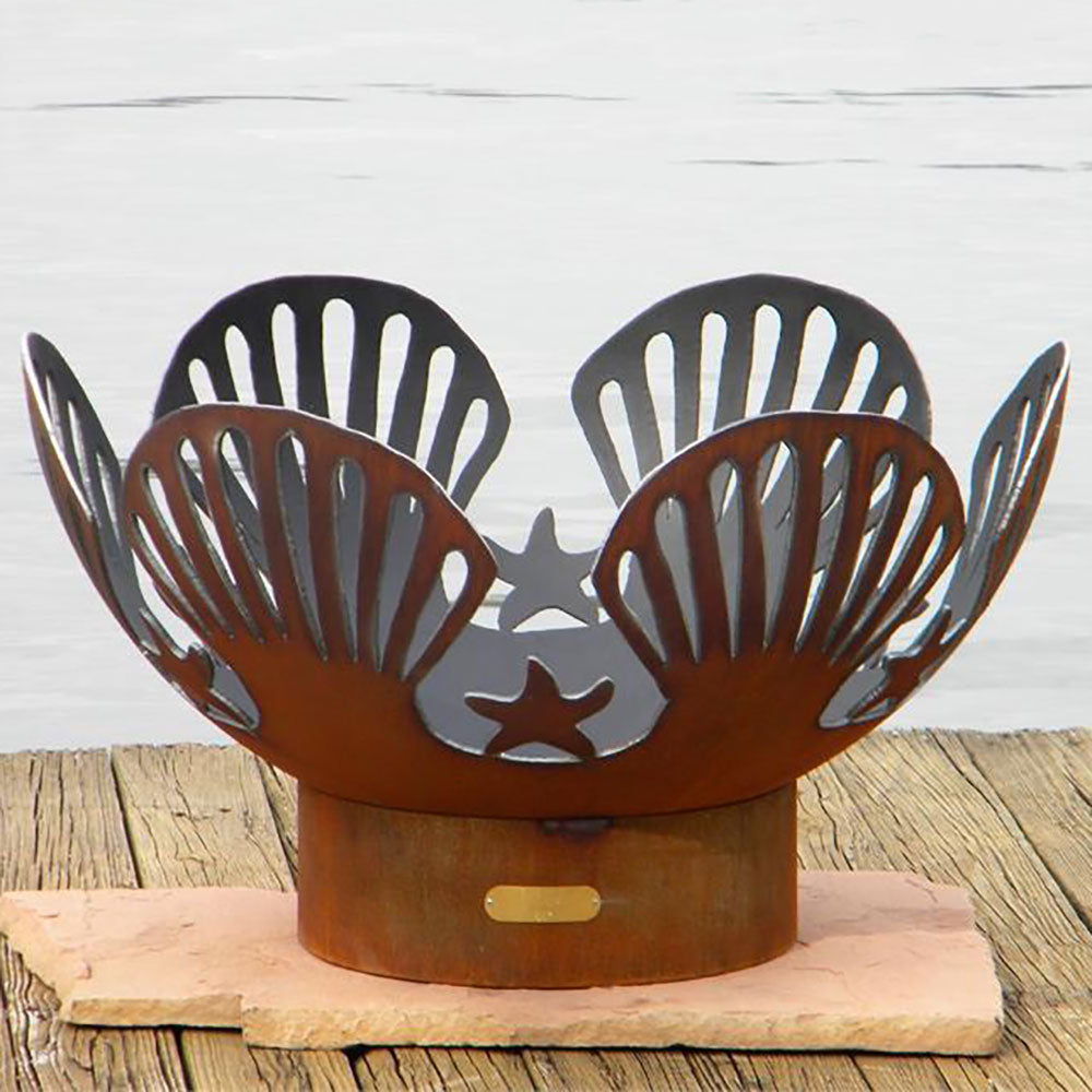 Patina gas fire pit with decorative fan screens and a star cutout