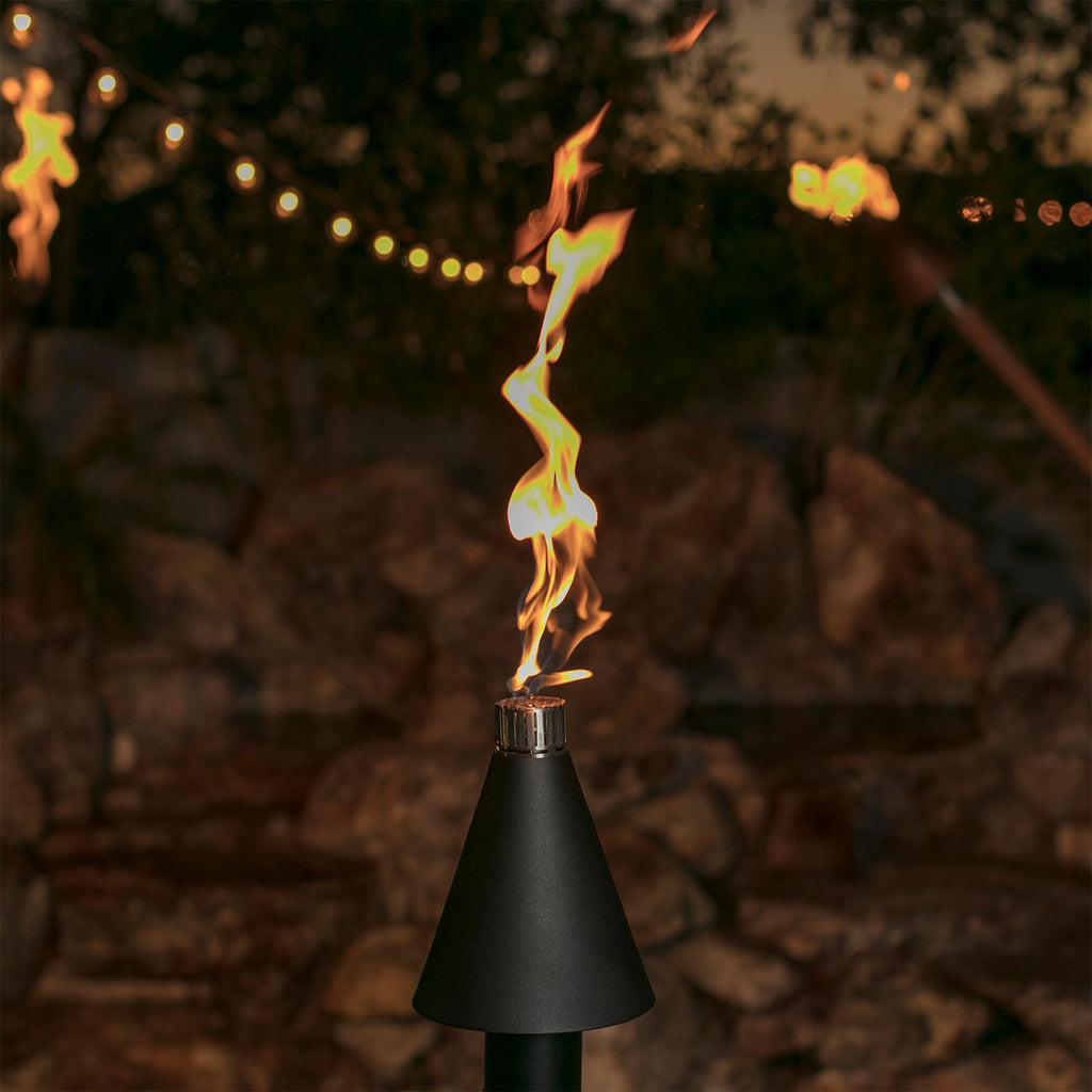 Black cone gas torch head with visible flame from burner.