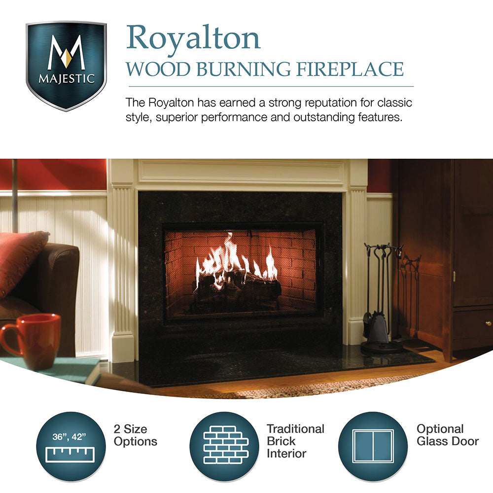 Wood burning fireplace with burning logs behind glass and decorative fireplace tools