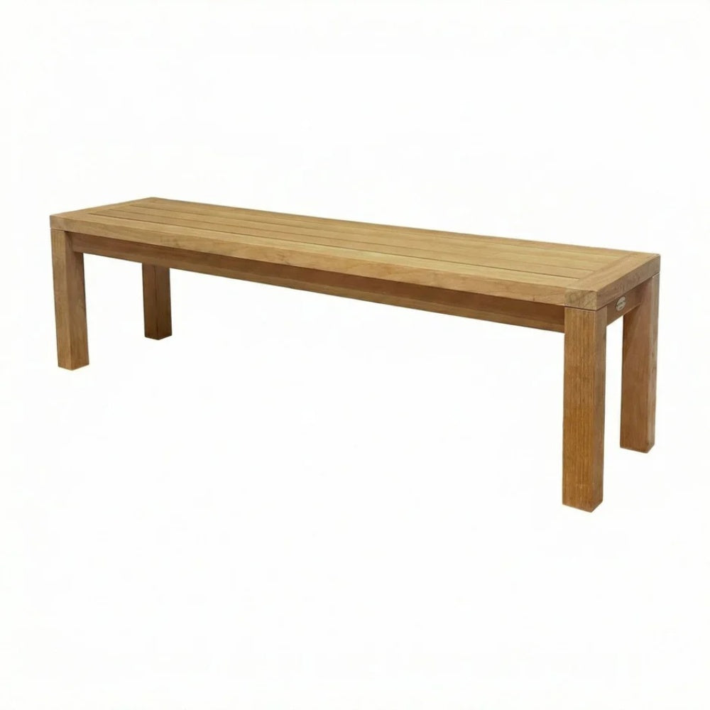 Solid teak dining bench with slatted tabletop and tapered legs, rectangular design.