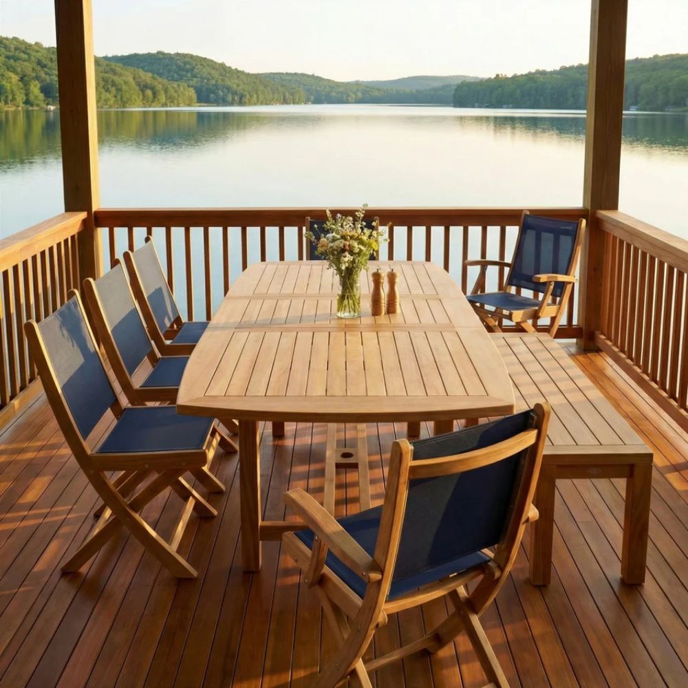 Solid teak dining bench with slatted tabletop and four tapered legs for outdoor use.