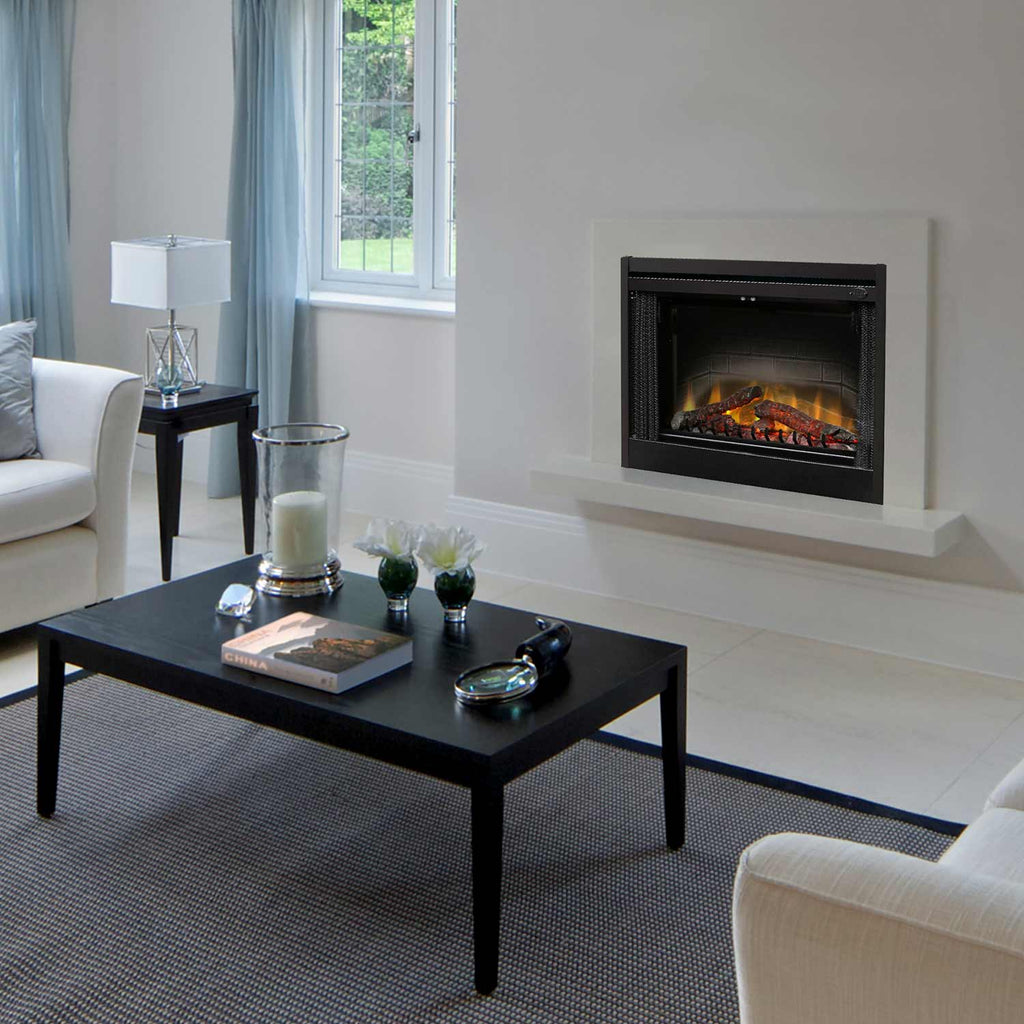 Electric fireplace insert set into wall with dark frame and flame log effect