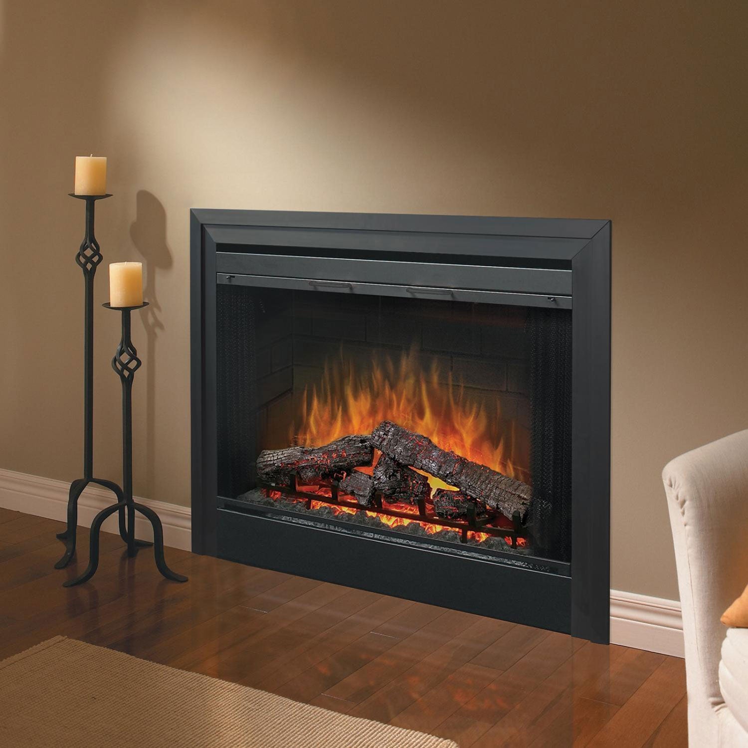 Electric fireplace insert with dark trim surround, visible flame effect in room