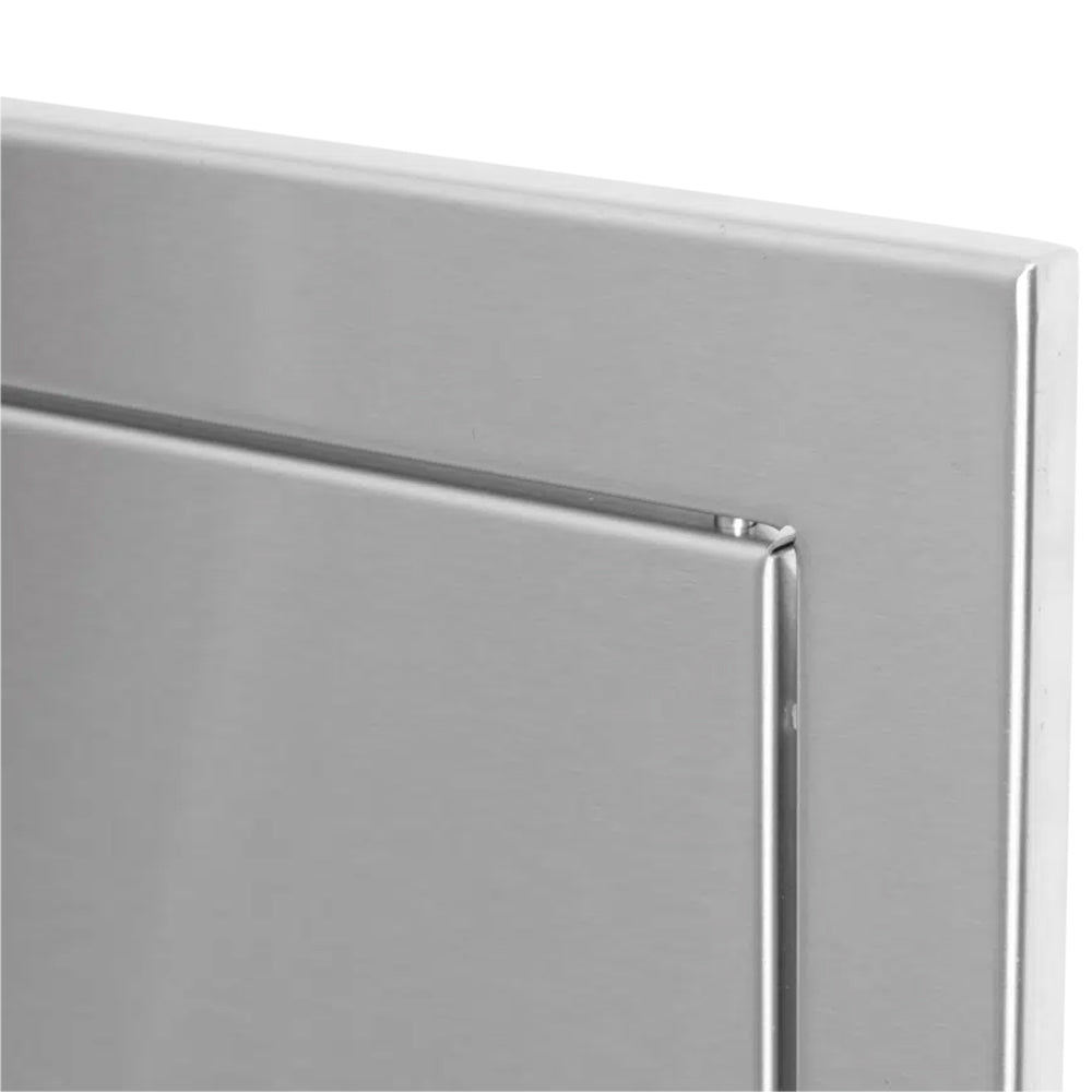 Metal access door hinge and latch detail with small alignment tab