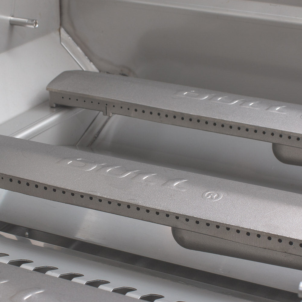 Stainless steel grill heat shield bars and perforated burner row inside the grill