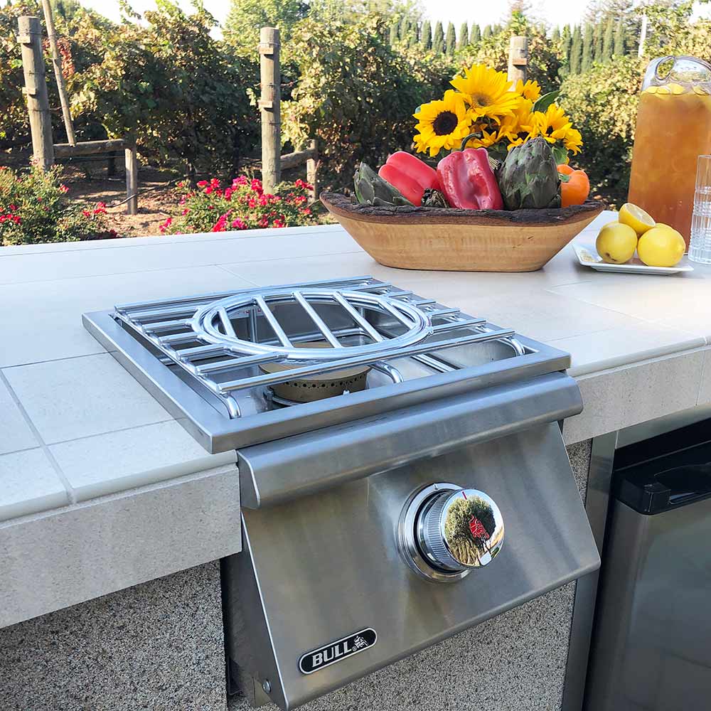 Stainless steel side burner with open grate and control knob