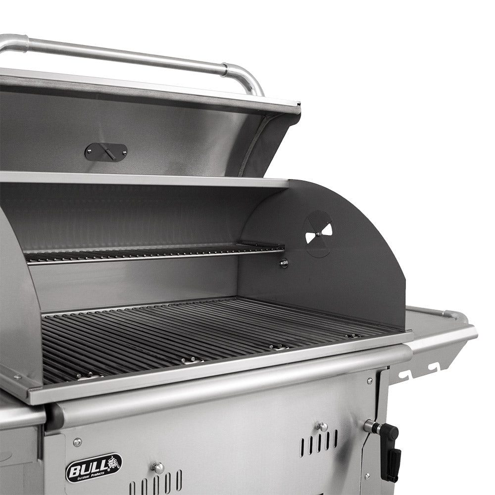 Open charcoal grill firebox with ribbed cooking grates and stainless side shelves