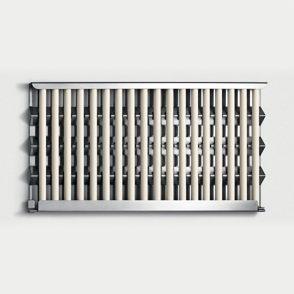 Built-in gas grill burner and grate panel with rows of stainless bars