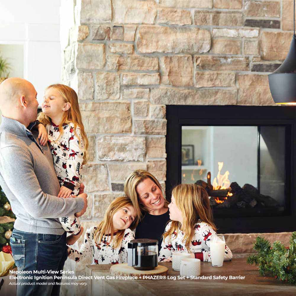 Black direct vent gas fireplace insert with flames behind safety glass in a stone wall