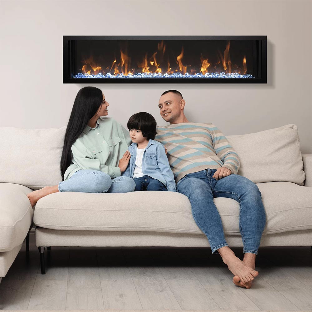 Wall-mounted slim electric fireplace showing glowing flame effect through the window