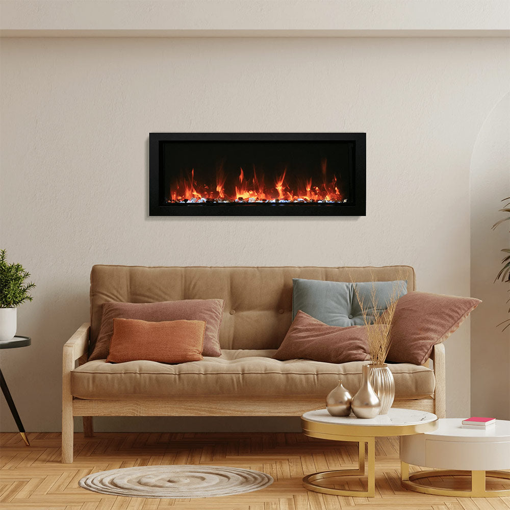 Wall-mounted slim electric fireplace with orange flame effect in a black frame