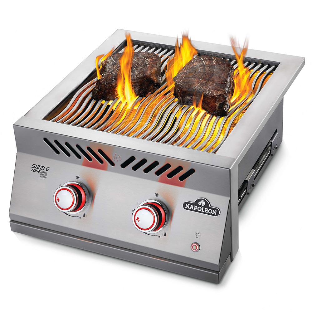 Stainless steel dual infrared grill burner with steaks and visible flames